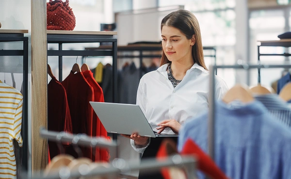 Retail store owner using iShopo